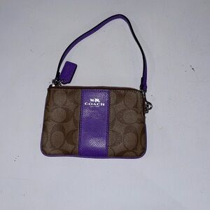 Coach classic clutch with purple accents